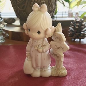 Precious Moments loving, caring sharing statue